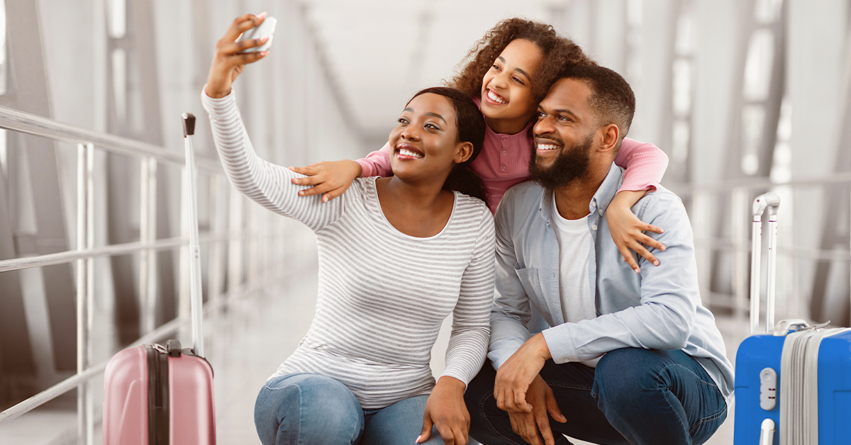 Take all the pictures that you want, but hold off on posting any pictures to social media until you return from your trip and are back home.